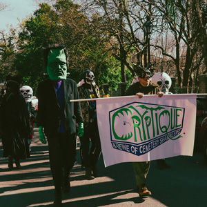 Cryptique krewe marching with our new banner